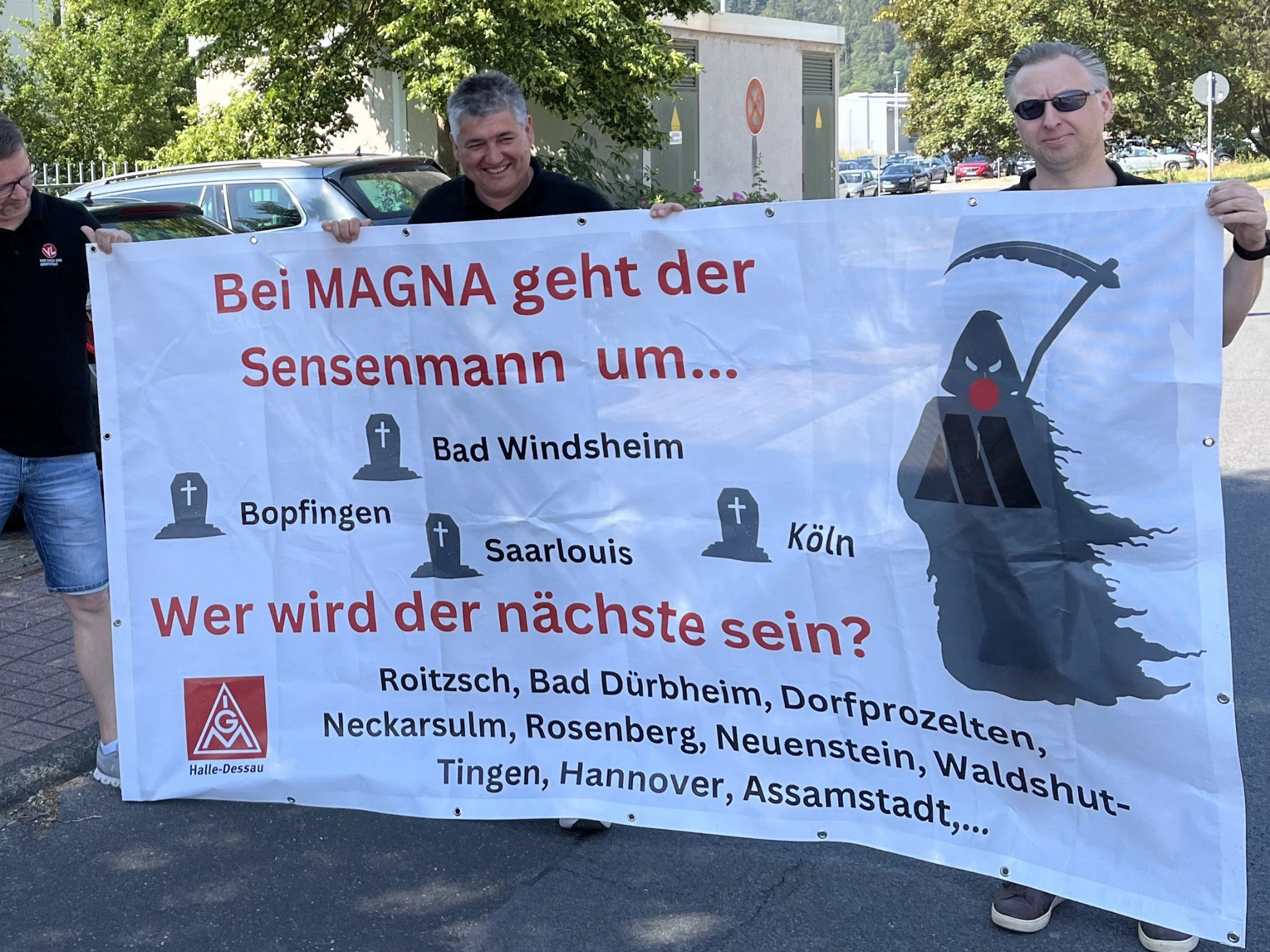 Das Banner zeigt einen "Magna-Sensenmann" und verweißt auf die bereits geschlossenen Standorte, sowie auf die gefährdeten Standorte